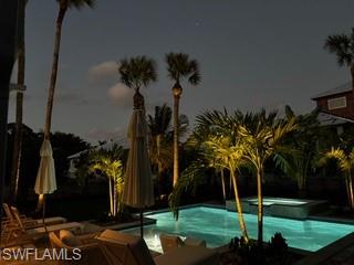 1437 Sandpiper Street Naples, FL 34102 - Photo 30 of 38 a view of a yard