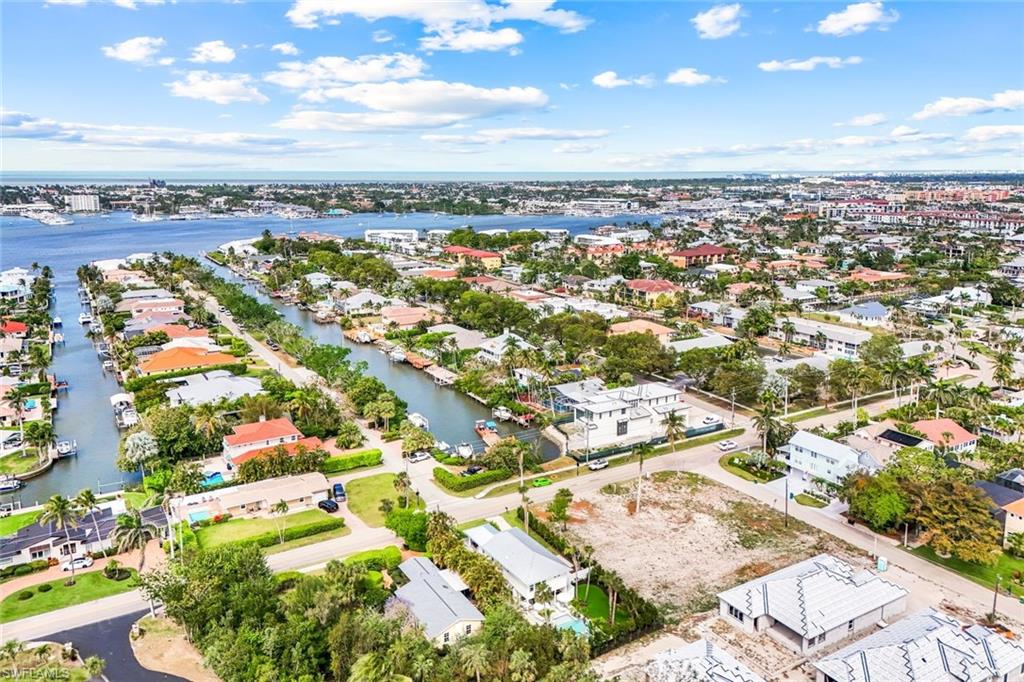 1437 Sandpiper Street Naples, FL 34102 - Photo 3 of 38 an aerial view of a city