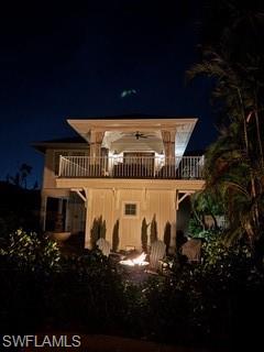 1437 Sandpiper Street Naples, FL 34102 - Photo 32 of 38 a view of a house with a yard