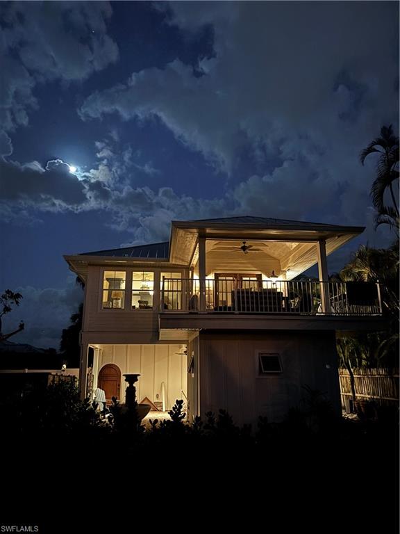 1437 Sandpiper Street Naples, FL 34102 - Photo 36 of 38 view of building with an outdoor space