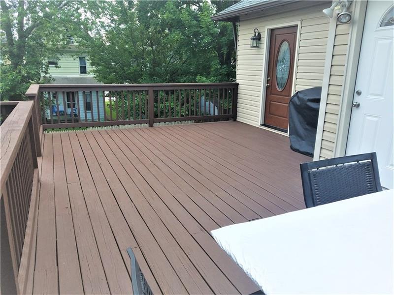 207 Reo Street Butler, PA 16001 - Photo 2 of 25 This home features a huge deck newly stained and 2 entry ways. One could be used as a business entry to a private room. Lots of options.