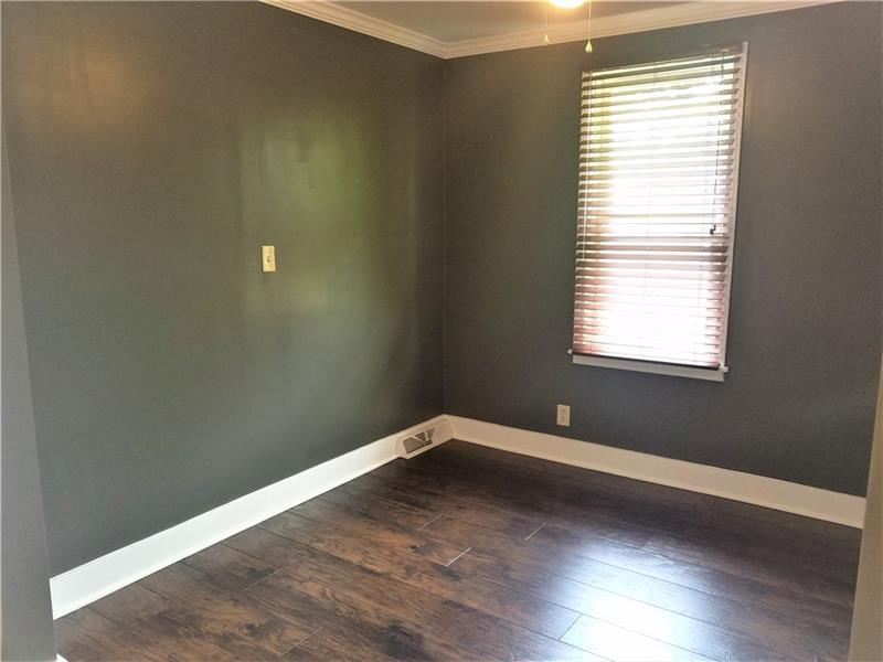 207 Reo Street Butler, PA 16001 - Photo 12 of 25 2nd bedroom with large closet and LVT new flooring. It's own separate entrance for privacy or in home business.