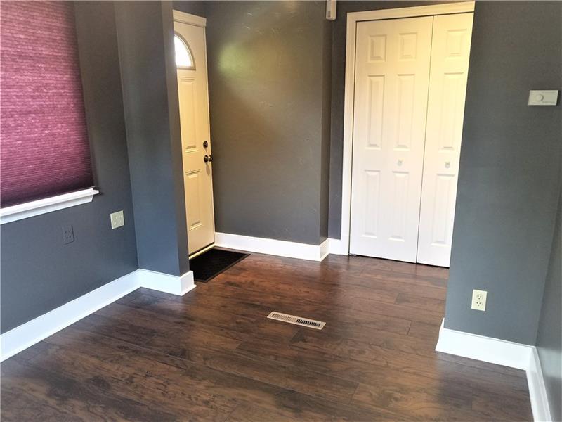207 Reo Street Butler, PA 16001 - Photo 13 of 25 This 2nd bedroom has a large closet and its separate entrance. Could be an office or business in your home. There is another door to the living area to close off.
