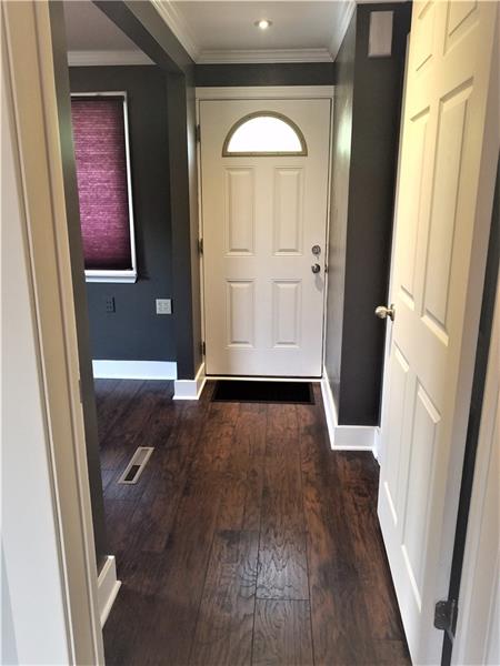 207 Reo Street Butler, PA 16001 - Photo 14 of 25 2nd entrance to 2nd bedroom area privately locked off from living room area.