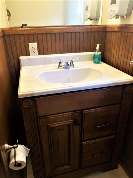 207 Reo Street Butler, PA 16001 - Photo 17 of 25 Beautiful new cabinet in main bathroom.