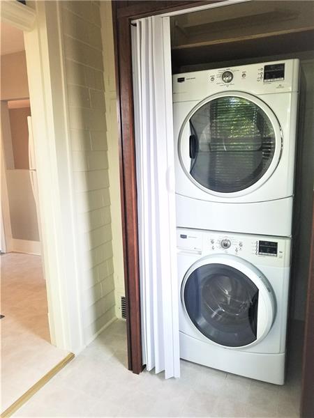 207 Reo Street Butler, PA 16001 - Photo 18 of 25 Full size stackable washer and dryer right off the kitchen in the bonus room.