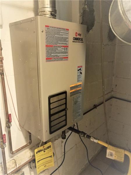 207 Reo Street Butler, PA 16001 - Photo 22 of 25 COMMERCIAL GRADE tankless hot water system.