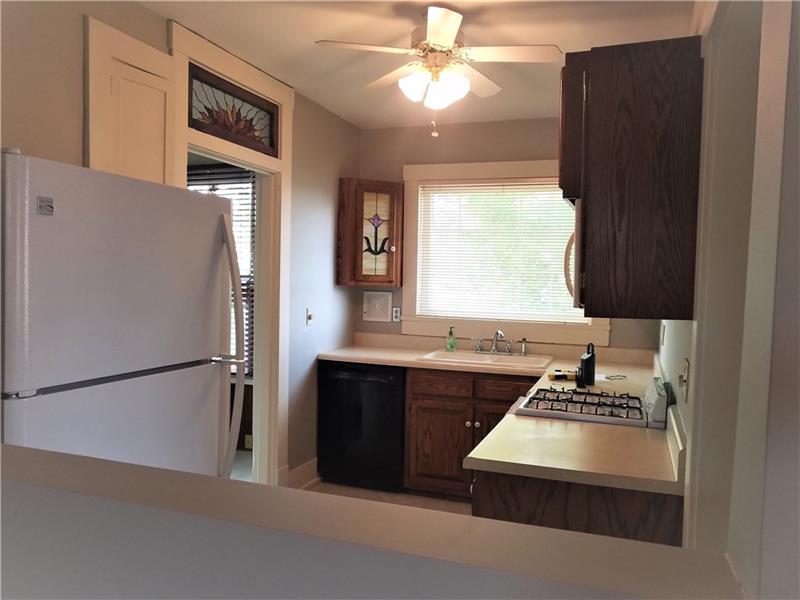 207 Reo Street Butler, PA 16001 - Photo 7 of 25 Pass through from living room to kitchen for ease of entertaining.