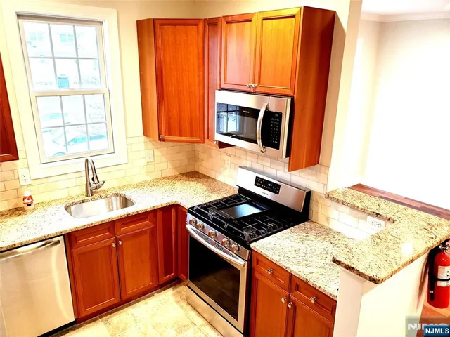 $580,000 | 67 Birch Street, Unit 310, Ridgefield Park, NJ 07660