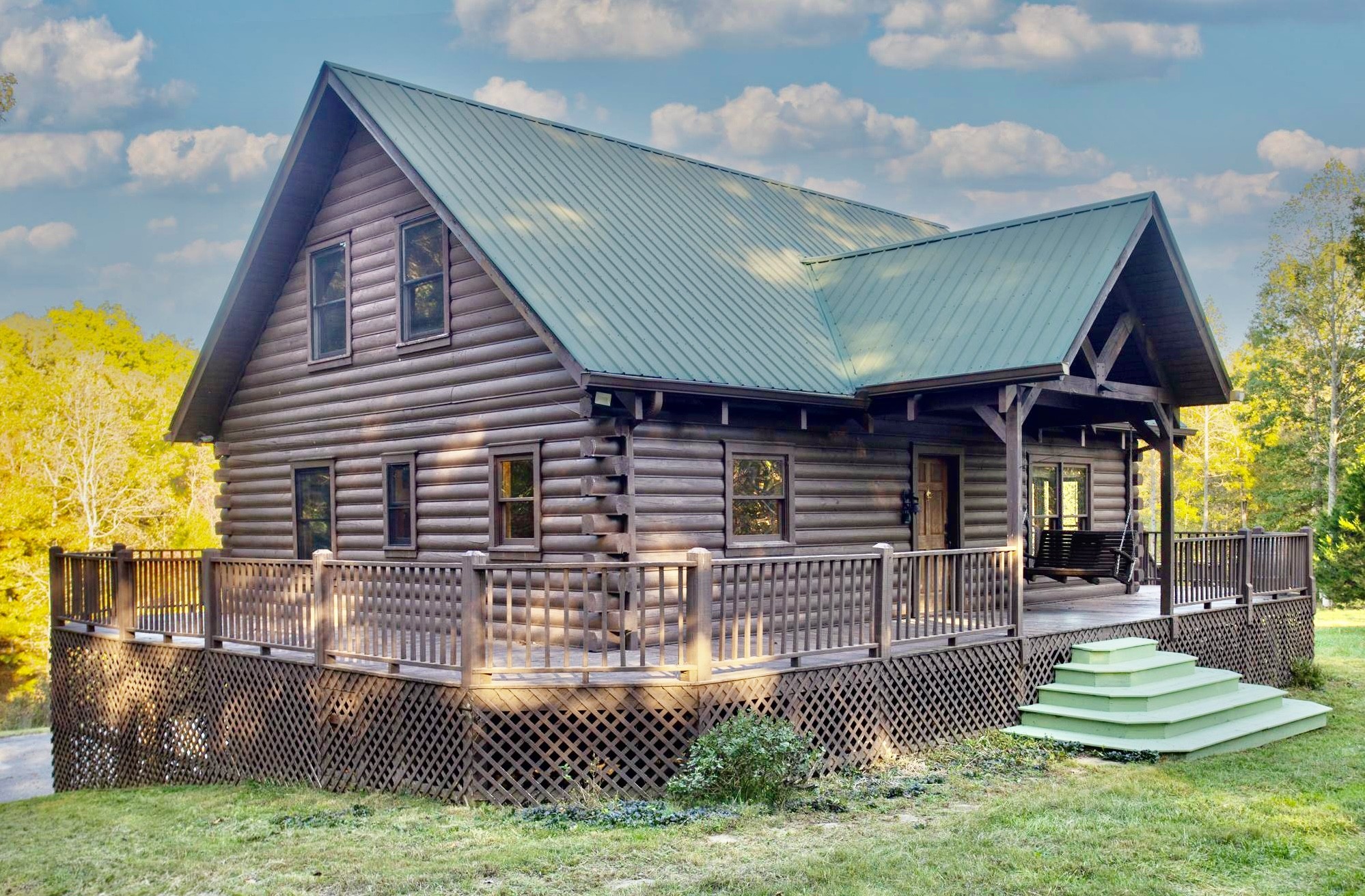 a view of house with backyard