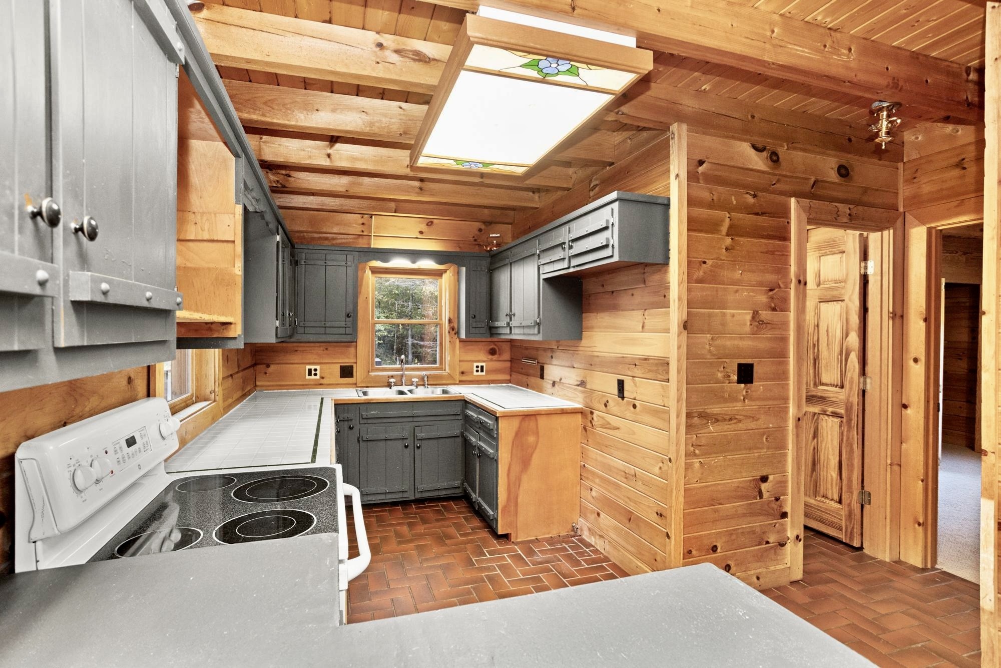 1420 Pack Road White Bluff, TN 37187 - Photo 14 of 47 a kitchen with a sink appliances and cabinets