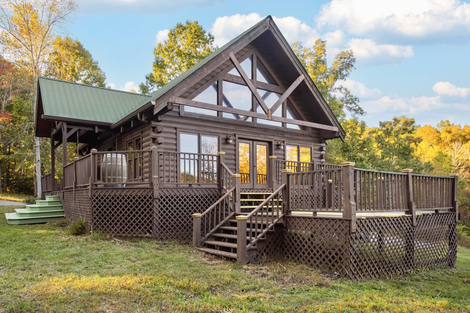 1420 Pack Road White Bluff, TN 37187 - Photo 35 of 47 a view of a house with a roof deck and a chair