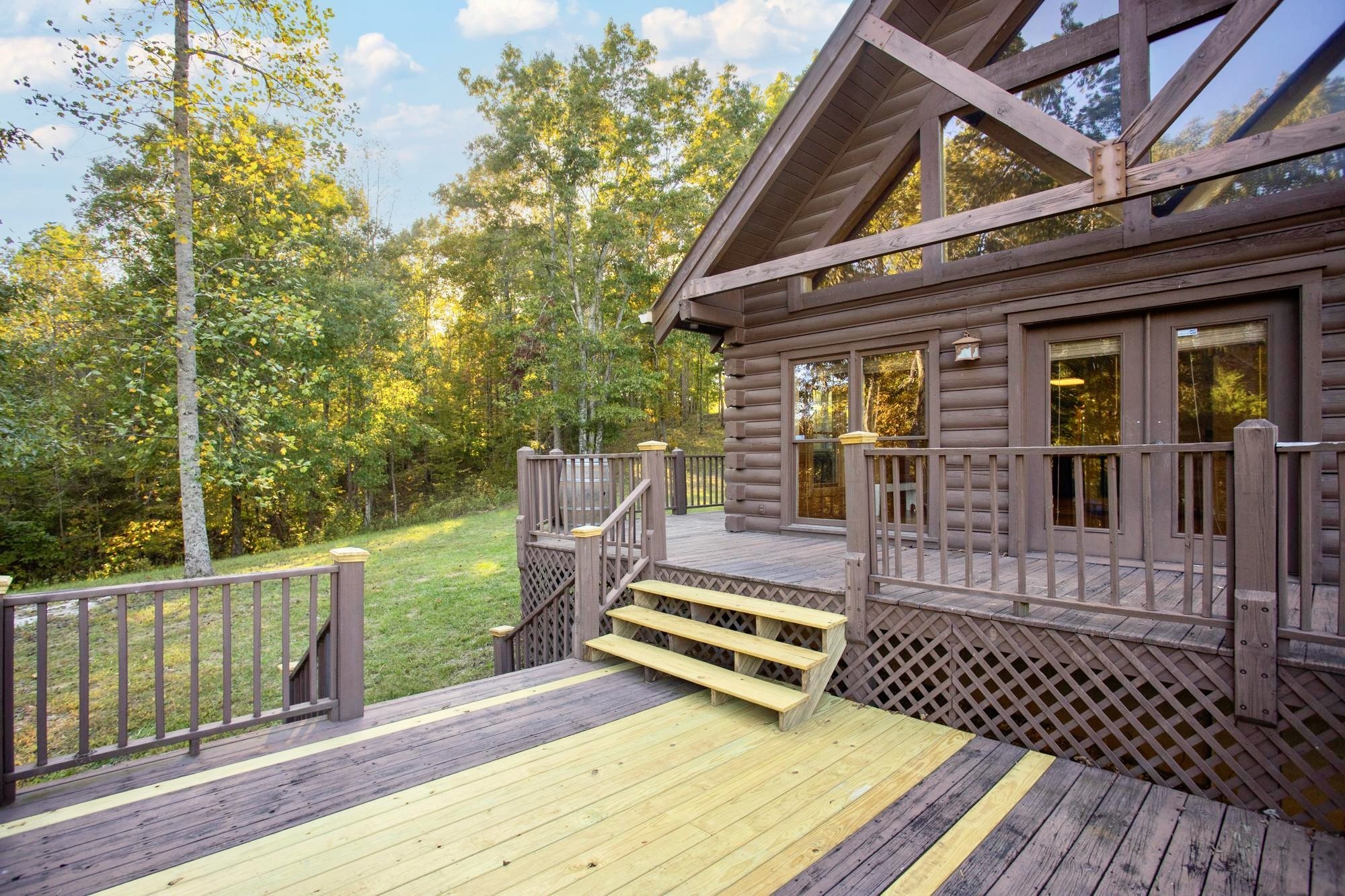 1420 Pack Road White Bluff, TN 37187 - Photo 37 of 47 a backyard of a house with barbeque oven table and chairs
