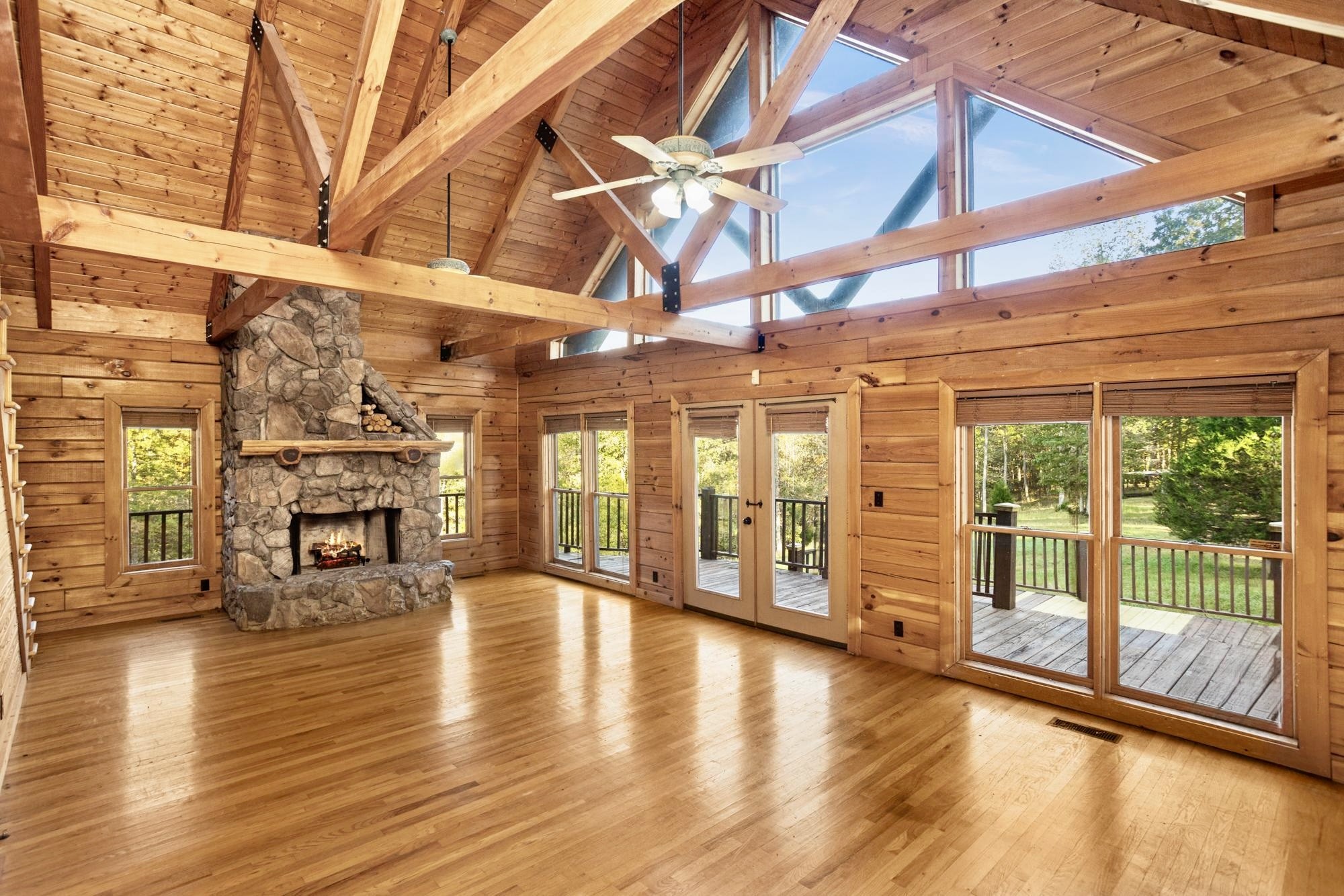 1420 Pack Road White Bluff, TN 37187 - Photo 8 of 47 a view of an empty room with wooden floor and a window