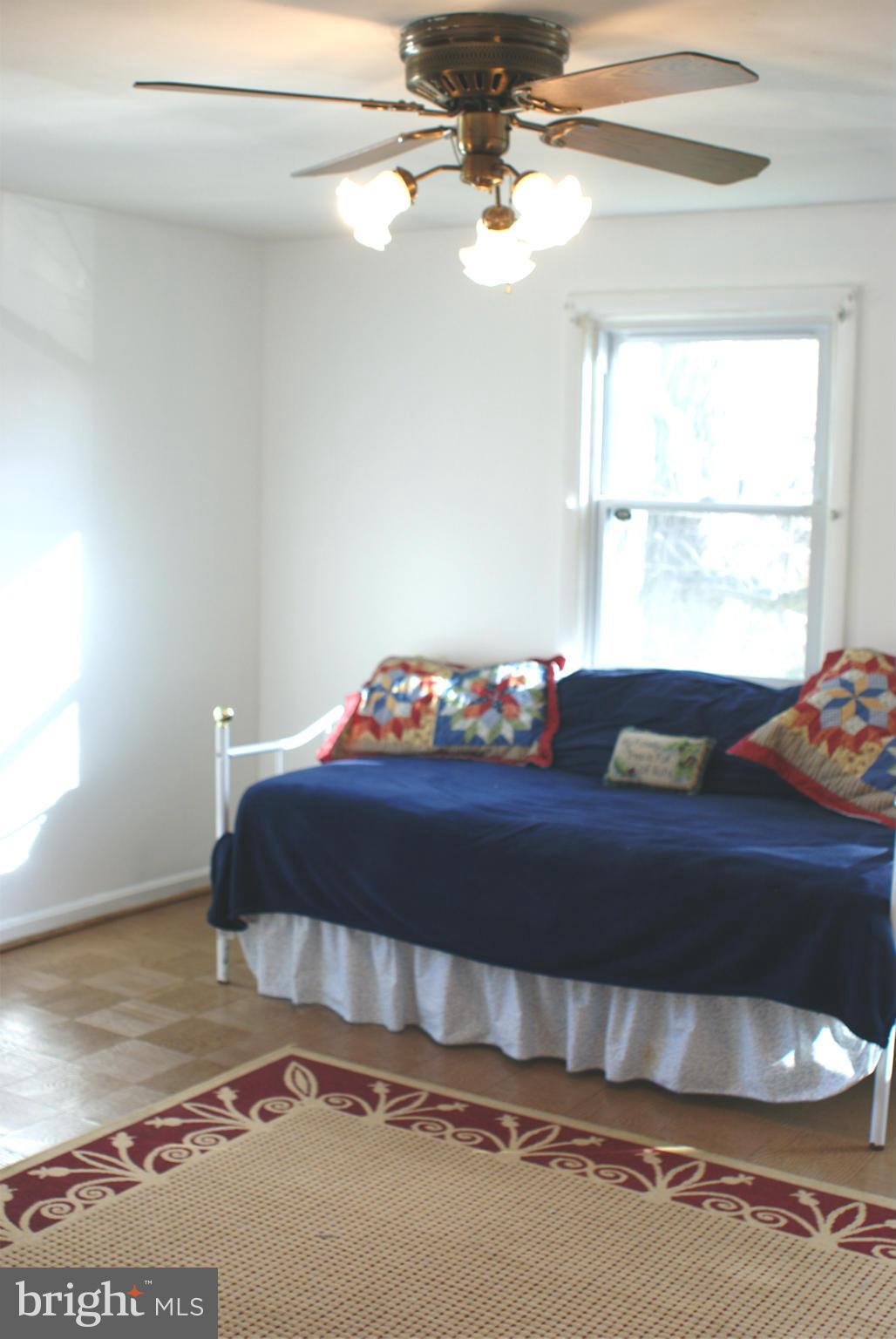 4505 Mahan Road Silver Spring, MD 20906 - Photo 11 of 22 a bedroom with a bed and window
