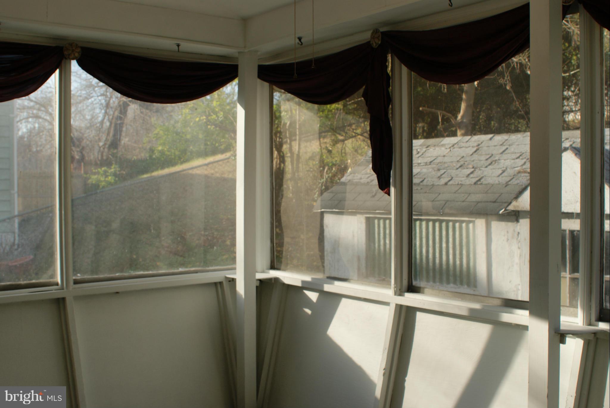 4505 Mahan Road Silver Spring, MD 20906 - Photo 19 of 22 a bathroom with a glass shower door