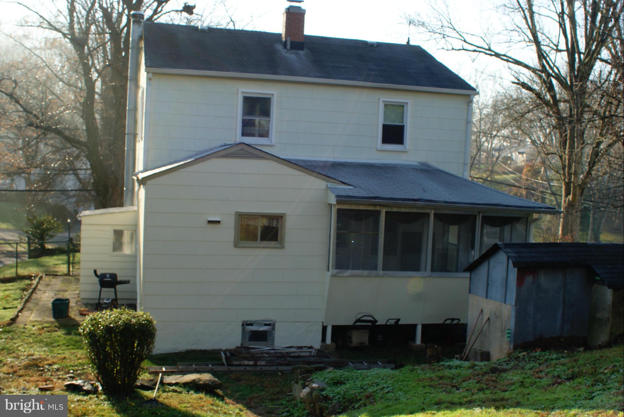 4505 Mahan Road Silver Spring, MD 20906 - Photo 21 of 22 a front view of house with yard and seating area