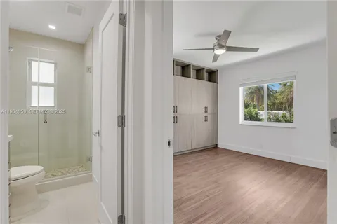 an aerial view of a city with lake view