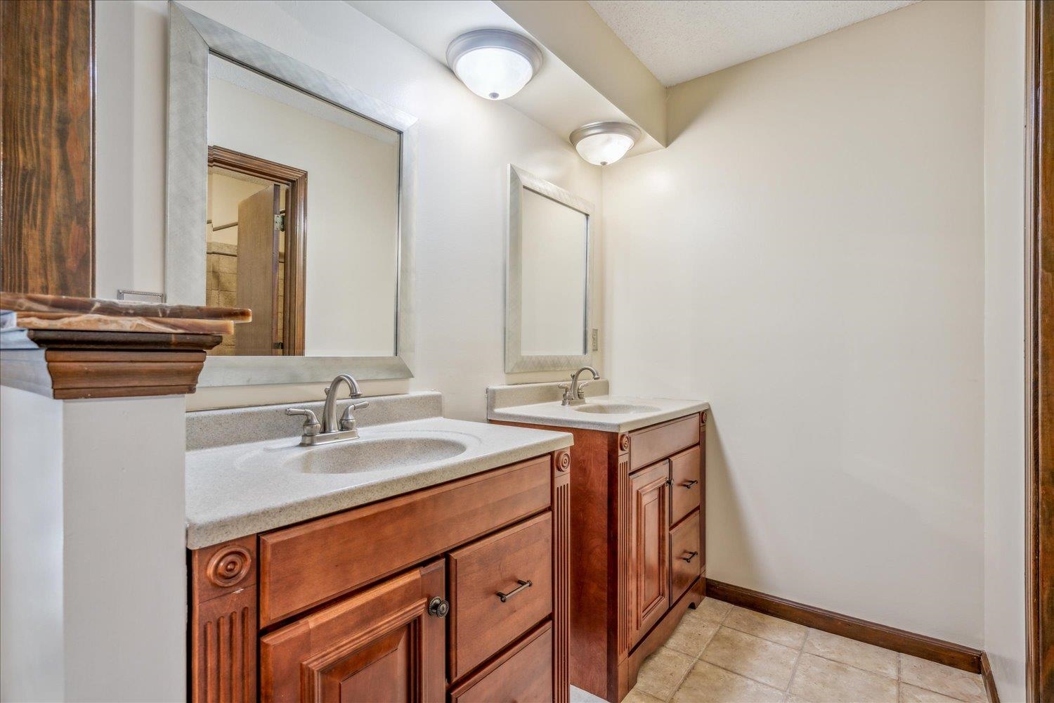 354 College Street Collierville, TN 38017 - Photo 18 of 33 a bathroom with a sink and a mirror