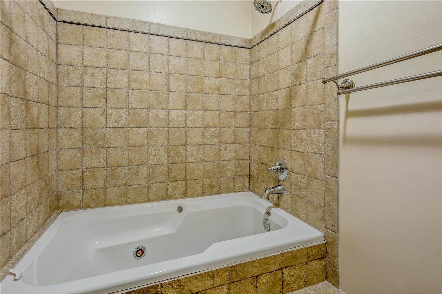 354 College Street Collierville, TN 38017 - Photo 19 of 33 a bathroom with a bathtub
