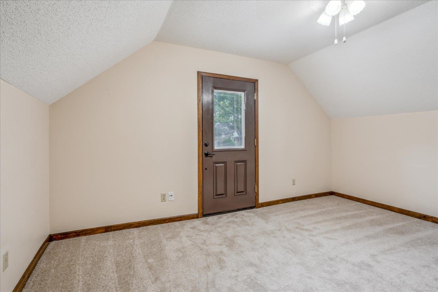 354 College Street Collierville, TN 38017 - Photo 22 of 33 an empty room with windows