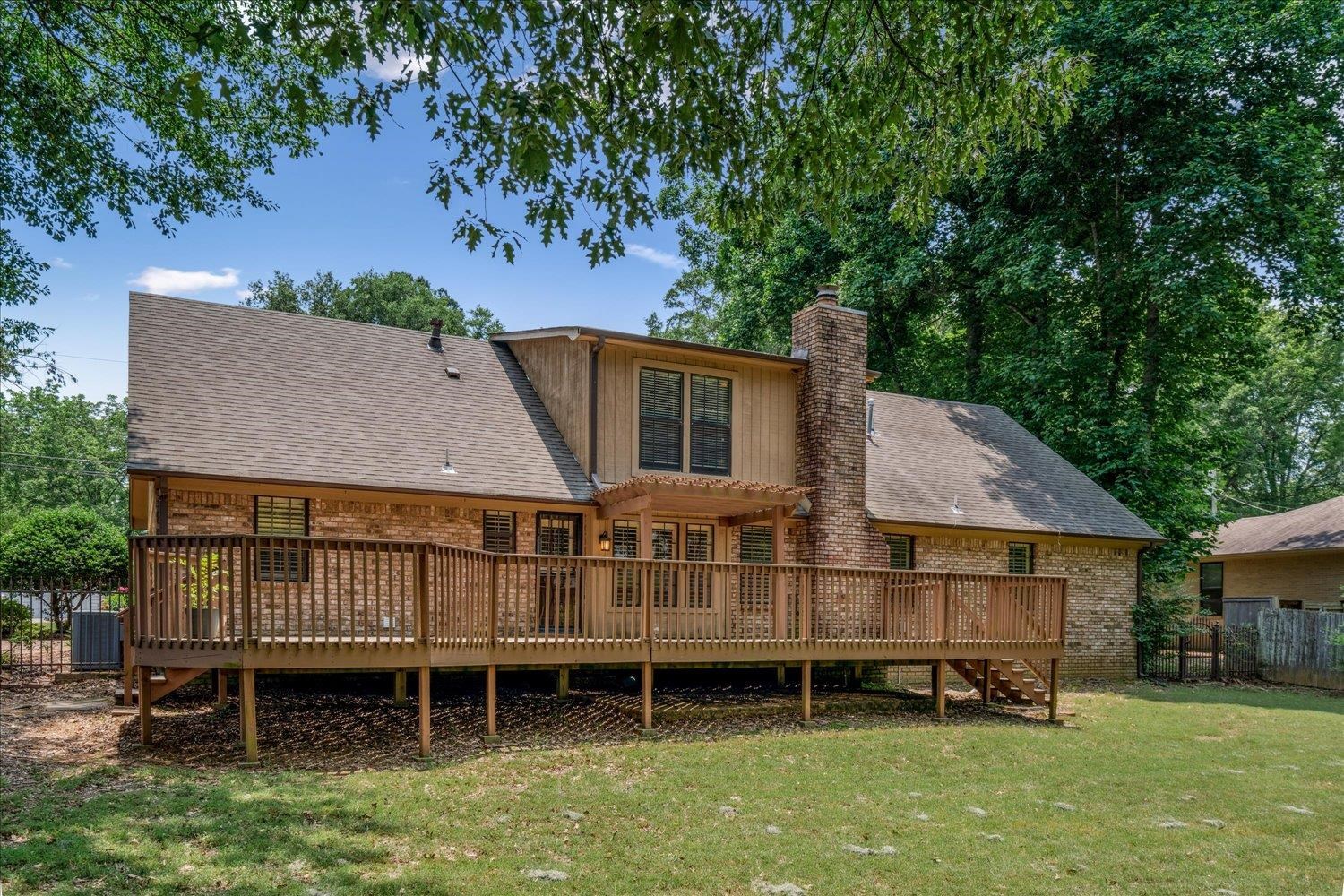 354 College Street Collierville, TN 38017 - Photo 28 of 33 an aerial view of a house with a backyard