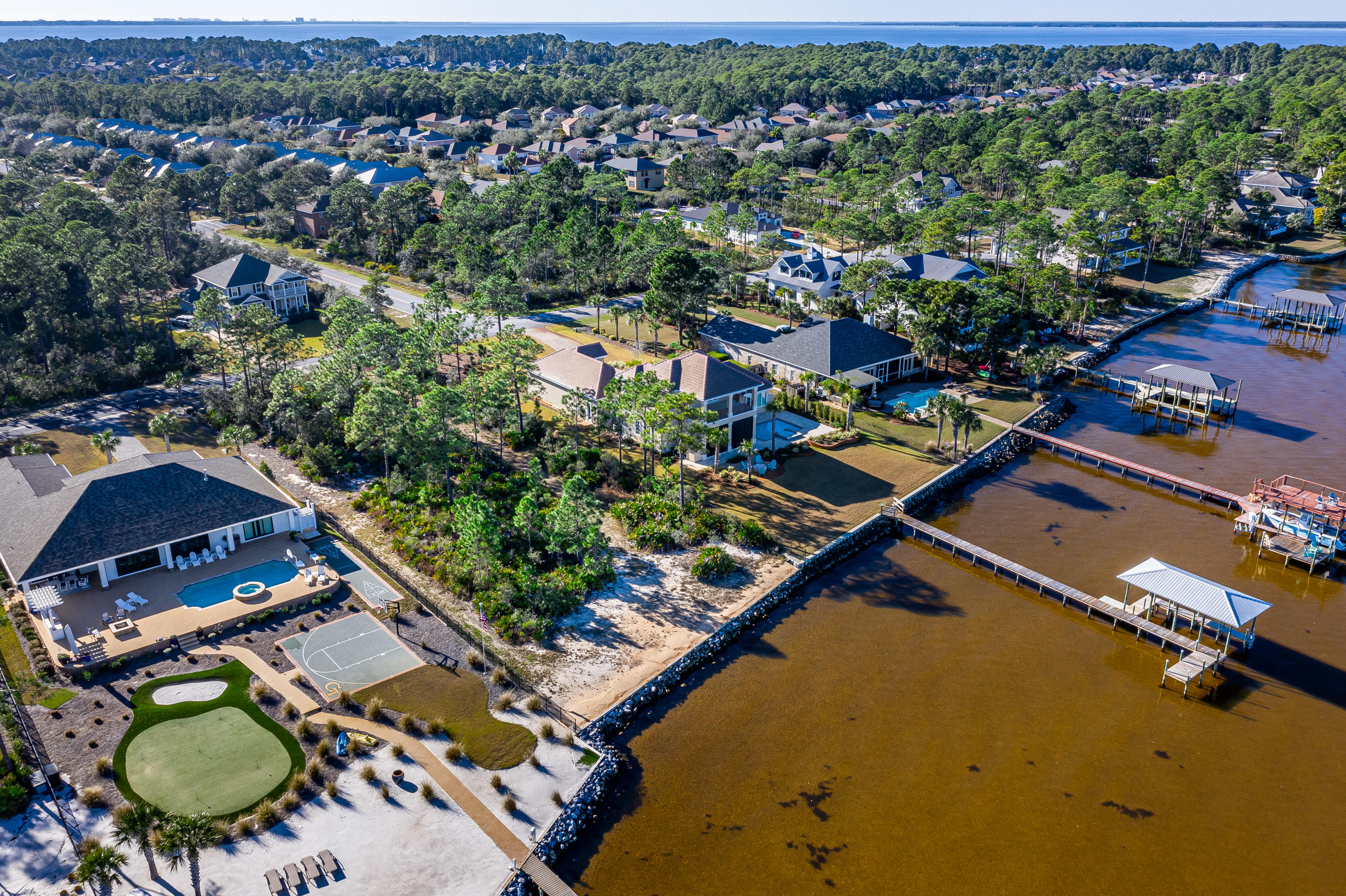 10J Driftwood Point Road Santa Rosa Beach, FL 32459 - Photo 8 of 20 an aerial view of residential houses with outdoor space