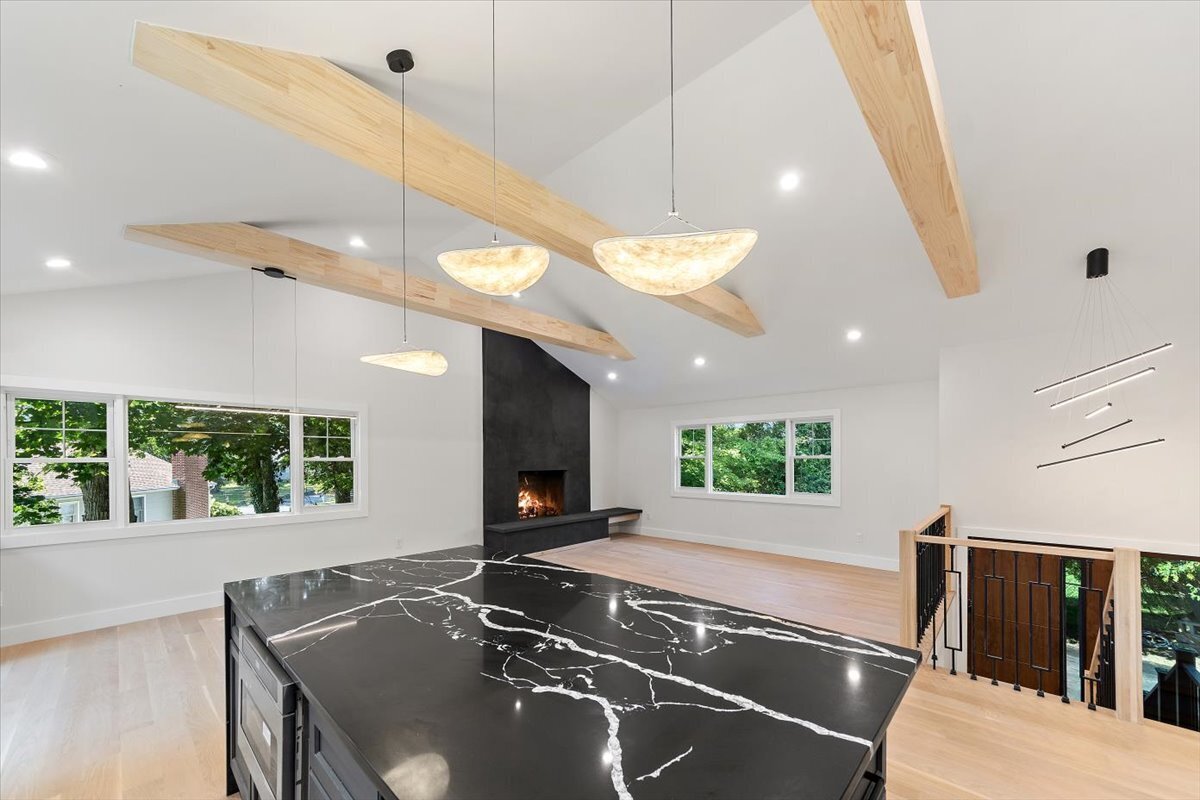115 Mayfair Road Fairfield, CT 06824 - Photo 15 of 36 a kitchen with a stove and a flat screen tv
