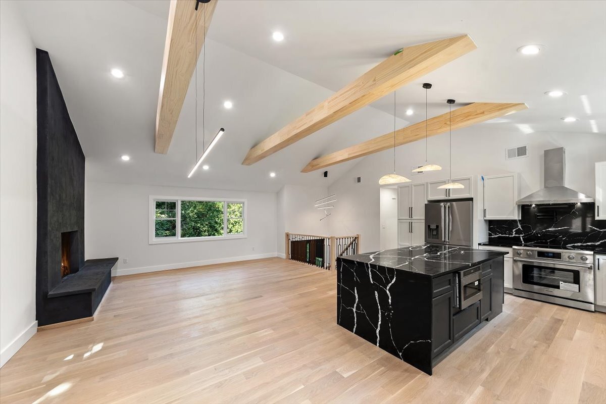115 Mayfair Road Fairfield, CT 06824 - Photo 16 of 36 a large kitchen with stainless steel appliances a large counter top