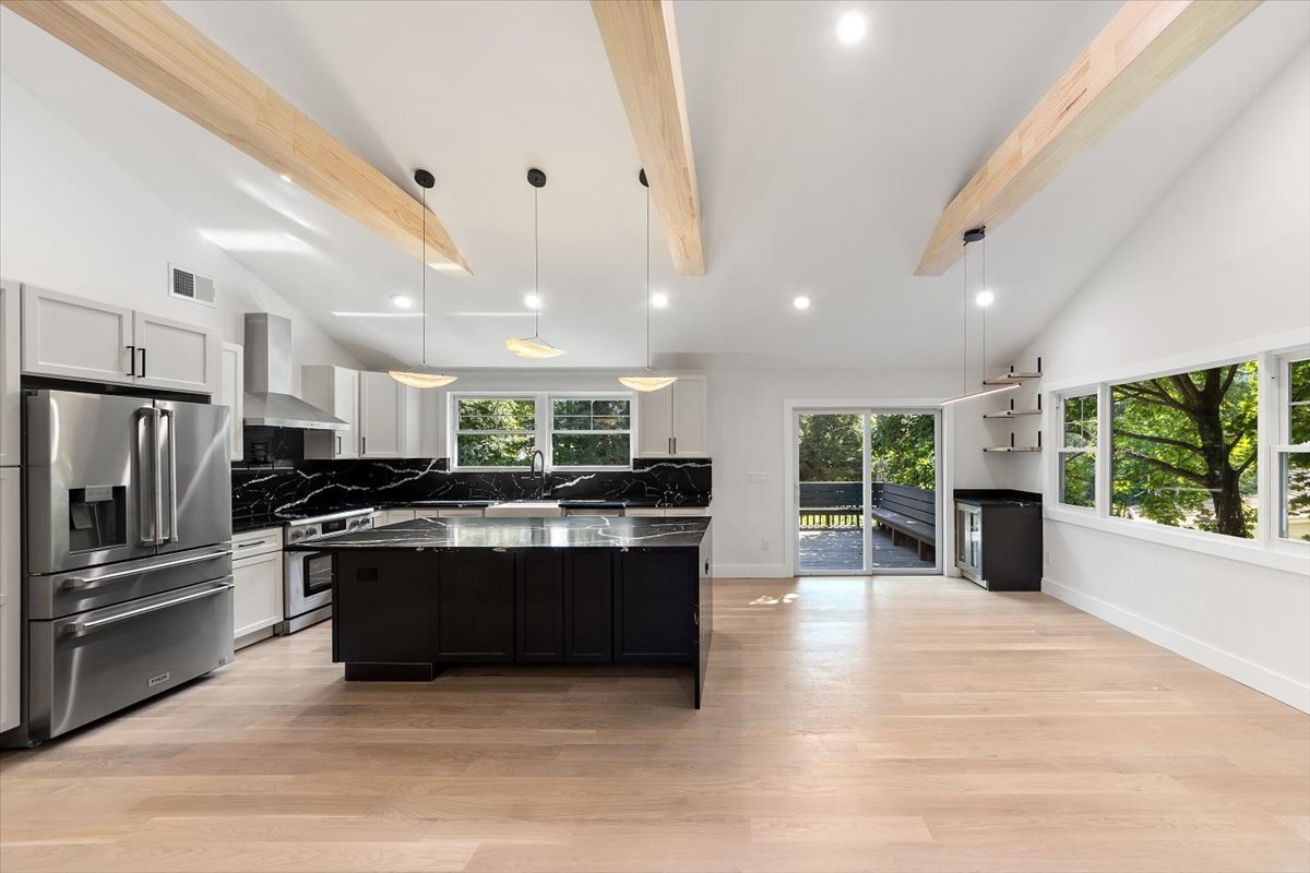 115 Mayfair Road Fairfield, CT 06824 - Photo 21 of 36 a large kitchen with stainless steel appliances granite countertop a large center island and a stove