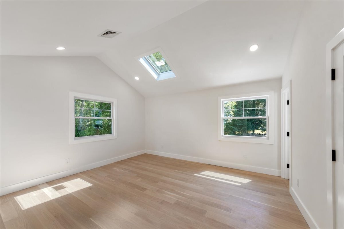 115 Mayfair Road Fairfield, CT 06824 - Photo 25 of 36 wooden floor in an empty room with a window