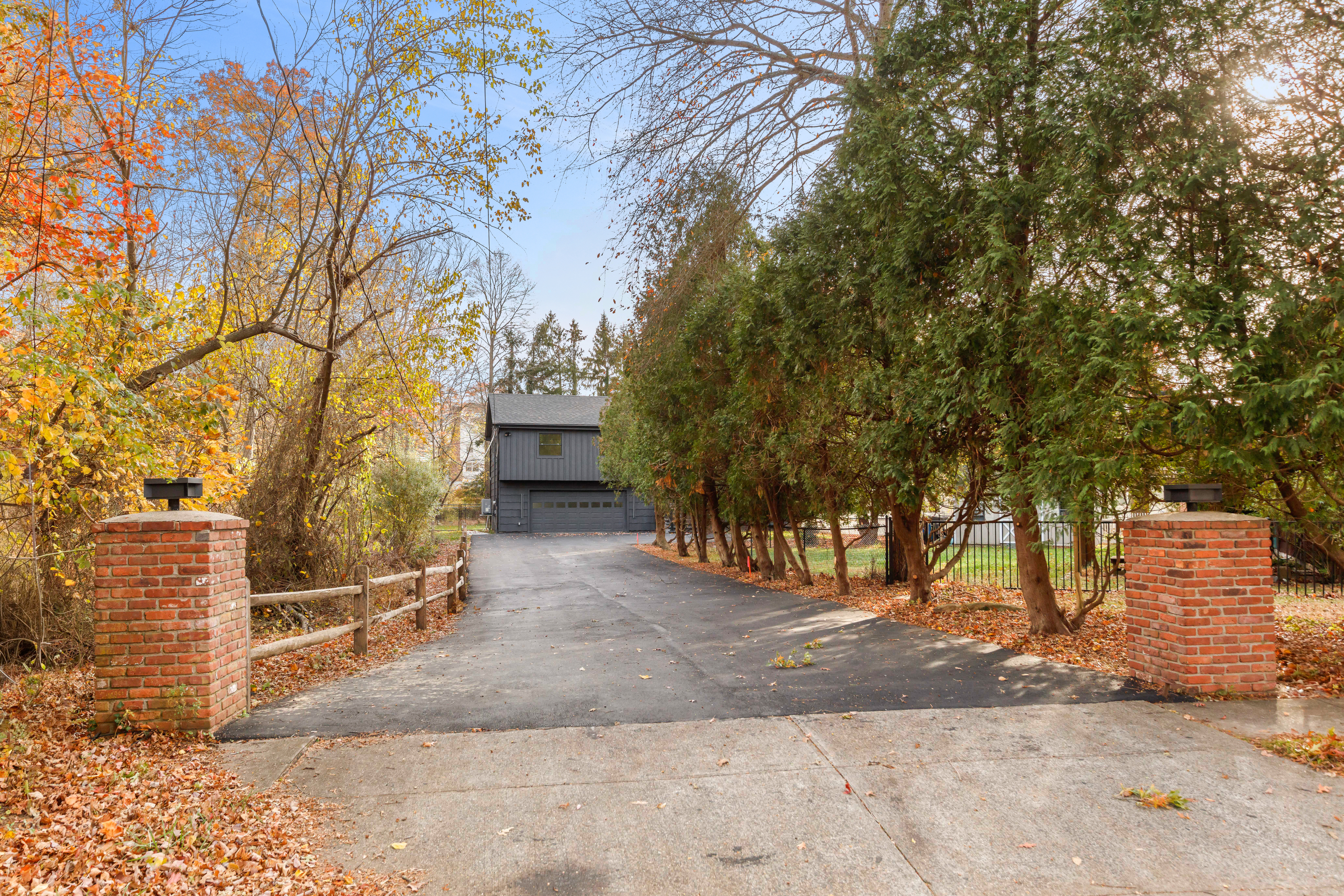 115 Mayfair Road Fairfield, CT 06824 - Photo 4 of 36 a view of road and trees