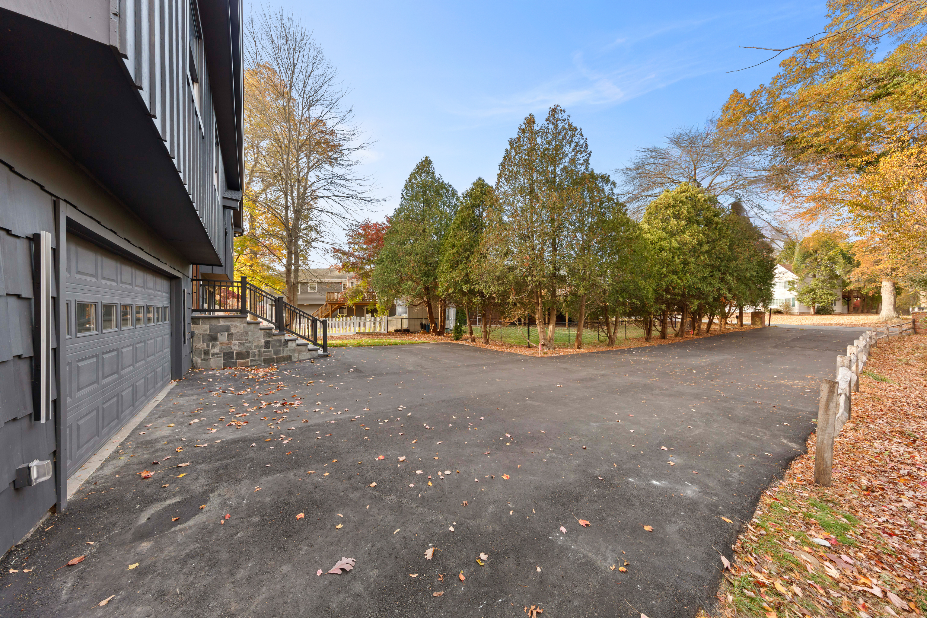 115 Mayfair Road Fairfield, CT 06824 - Photo 6 of 36 a view of road and trees