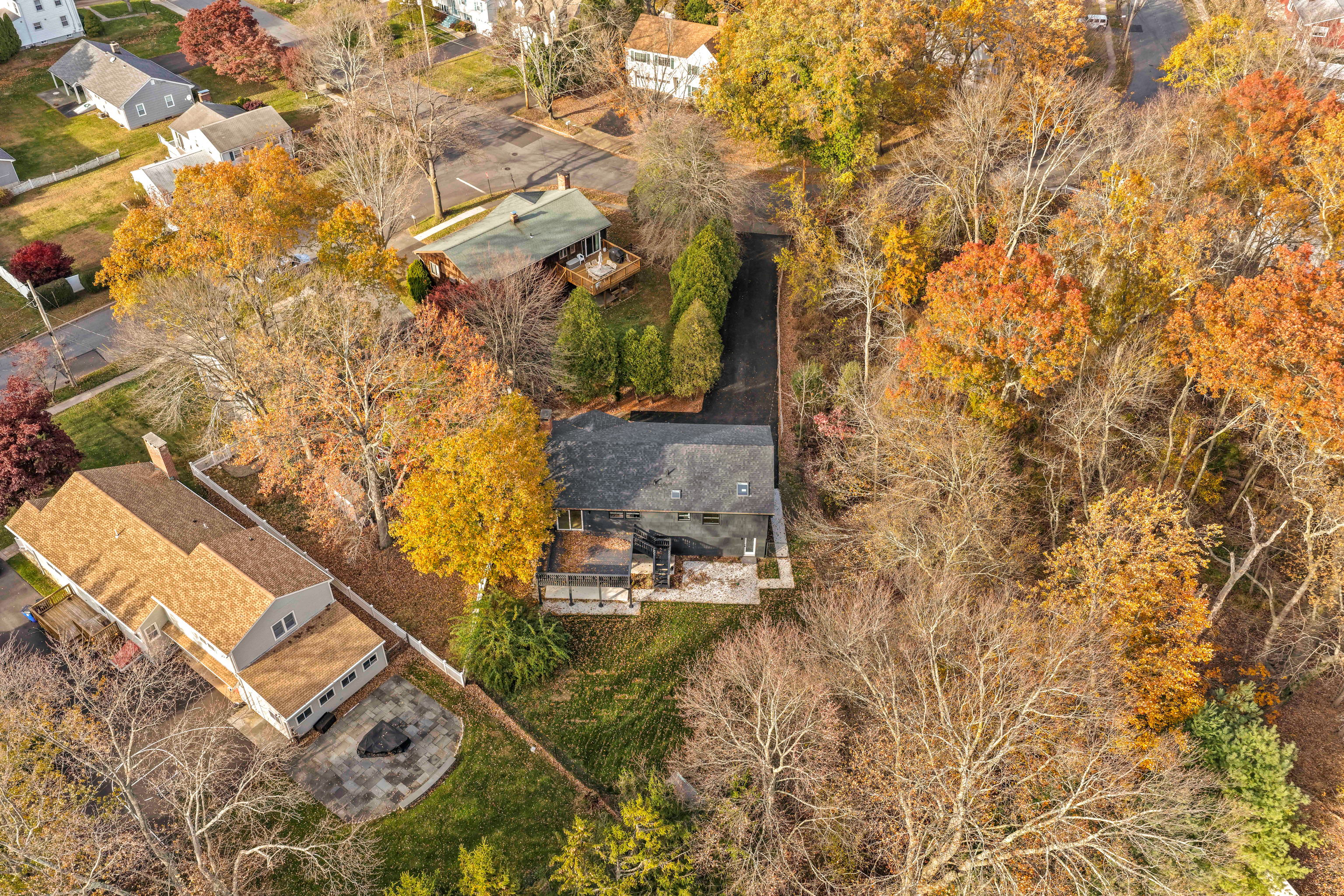 115 Mayfair Road Fairfield, CT 06824 - Photo 10 of 36 a aerial view of a house with a yard