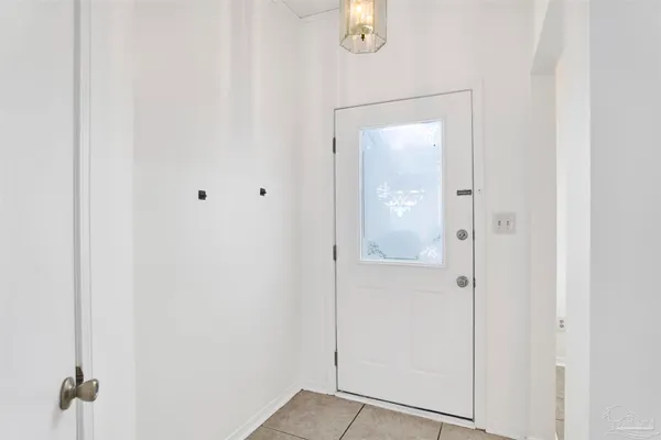 a view of a bathroom with a glass shower door