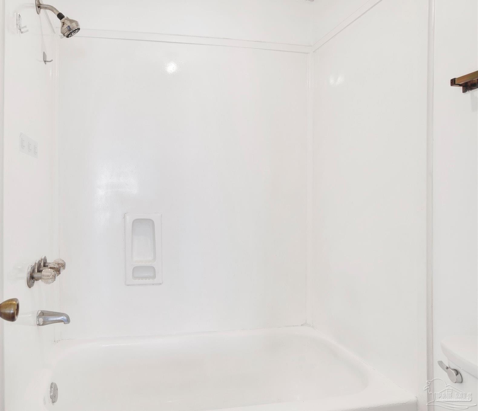 601 East Burgess Road, Unit K11 Pensacola, FL 32504 - Photo 30 of 34 a close up of a bathtub