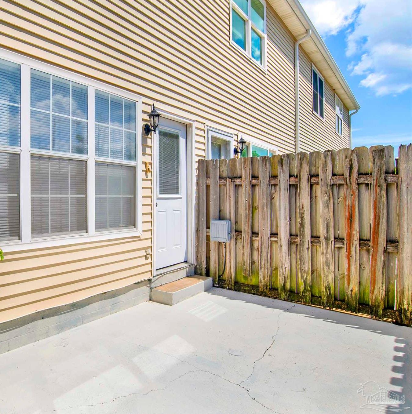 601 East Burgess Road, Unit K11 Pensacola, FL 32504 - Photo 31 of 34 a view of a house with a outdoor space
