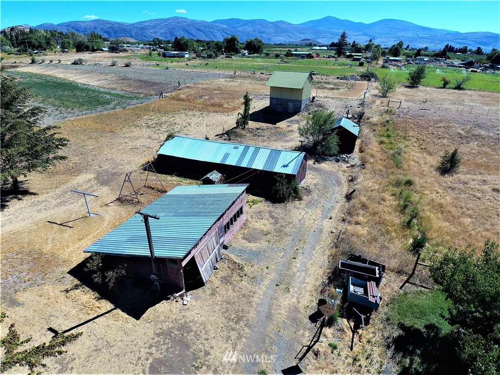 62 North Kirkpatrick Road North Omak, WA 98841 - Photo 2 of 33 an aerial view of a house with a yard
