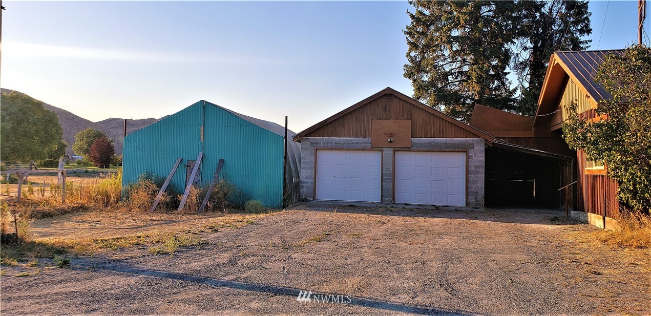 62 North Kirkpatrick Road North Omak, WA 98841 - Photo 7 of 33 a front view of a house with a yard