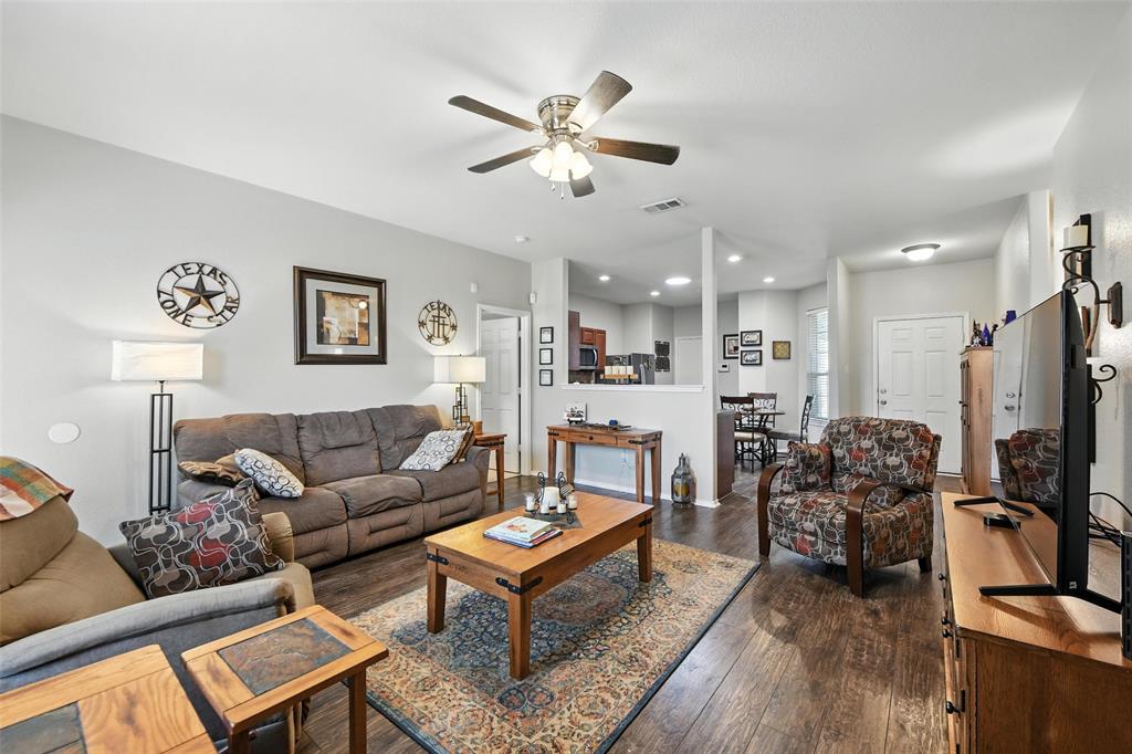 5817 Deck House Road Fort Worth, TX 76179 - Photo 21 of 28 a living room with furniture kitchen view and a window