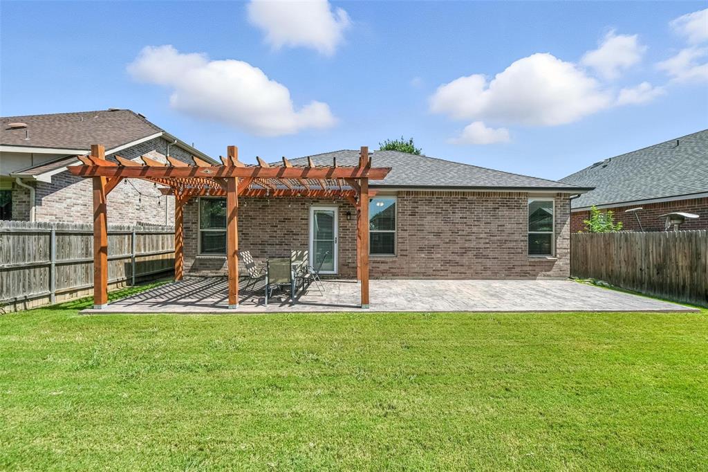 5817 Deck House Road Fort Worth, TX 76179 - Photo 5 of 28 a view of a house with a yard and sitting area