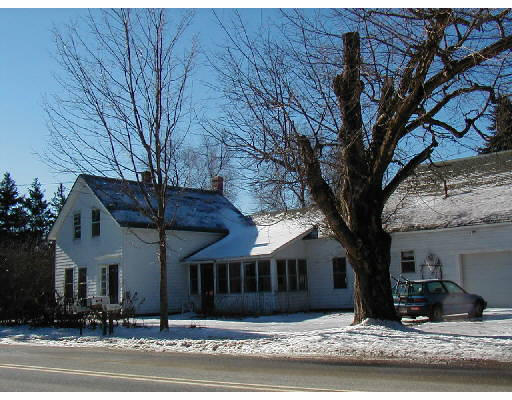 366 Plain Road Greenfield, MA 01301 - Photo 1 of 1 a view of a white house with a tree