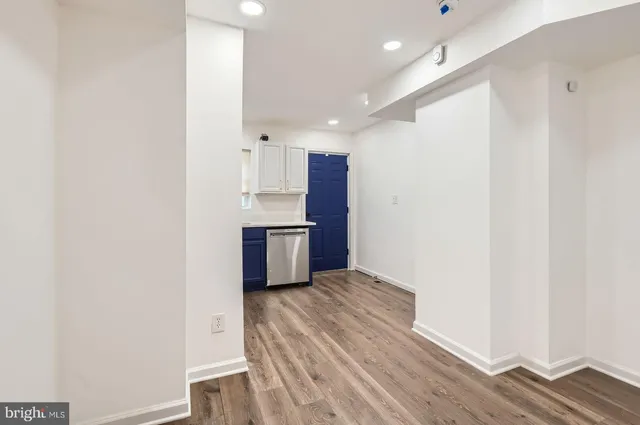 a view of kitchen with wooden floor