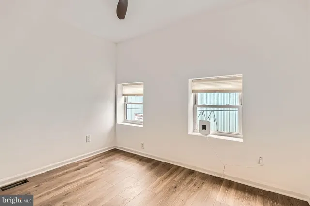 an empty room with windows