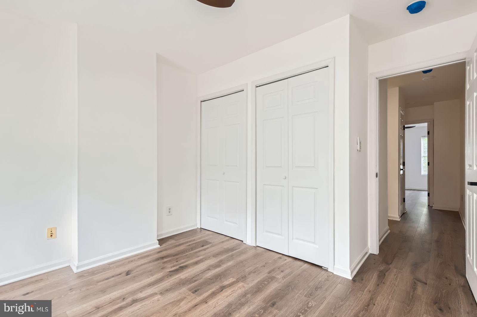 1440 Ward Street Baltimore, MD 21230 - Photo 15 of 27 a view of hallway with wooden floor