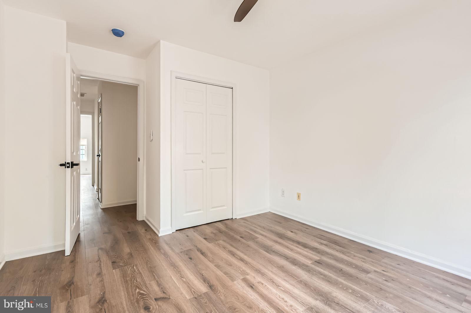 1440 Ward Street Baltimore, MD 21230 - Photo 18 of 27 a view of a room with wooden floor