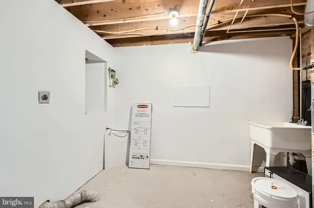a bathroom with a toilet and a sink