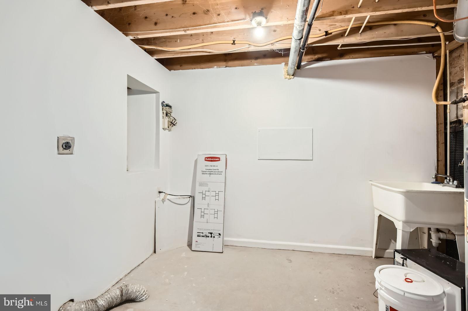 1440 Ward Street Baltimore, MD 21230 - Photo 24 of 27 a bathroom with a toilet and a sink