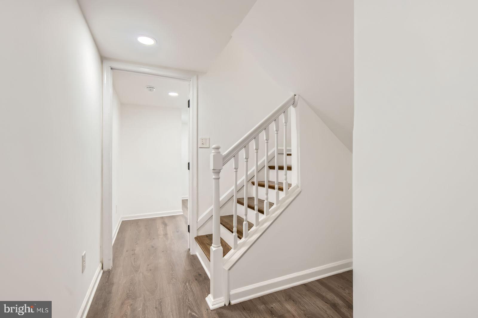 1440 Ward Street Baltimore, MD 21230 - Photo 25 of 27 a view of entryway with wooden floor