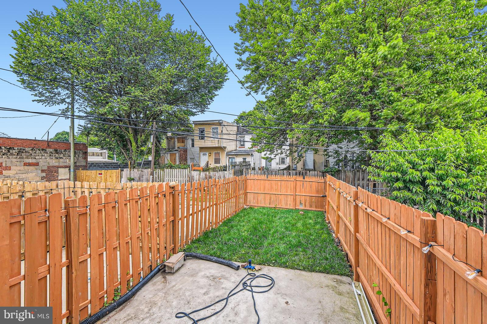 1440 Ward Street Baltimore, MD 21230 - Photo 26 of 27 a view of a garden with wooden deck